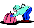Boy Lifting Pumpkin